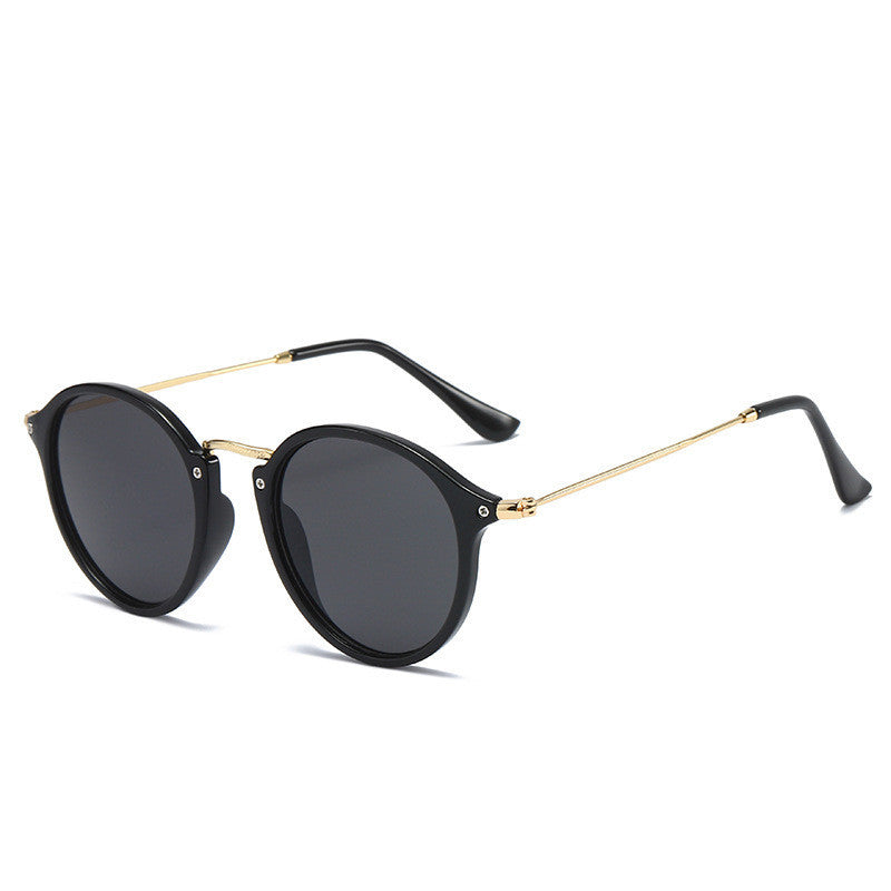 Round metal sunglasses with black and gold frame, UV400 protection, unisex design